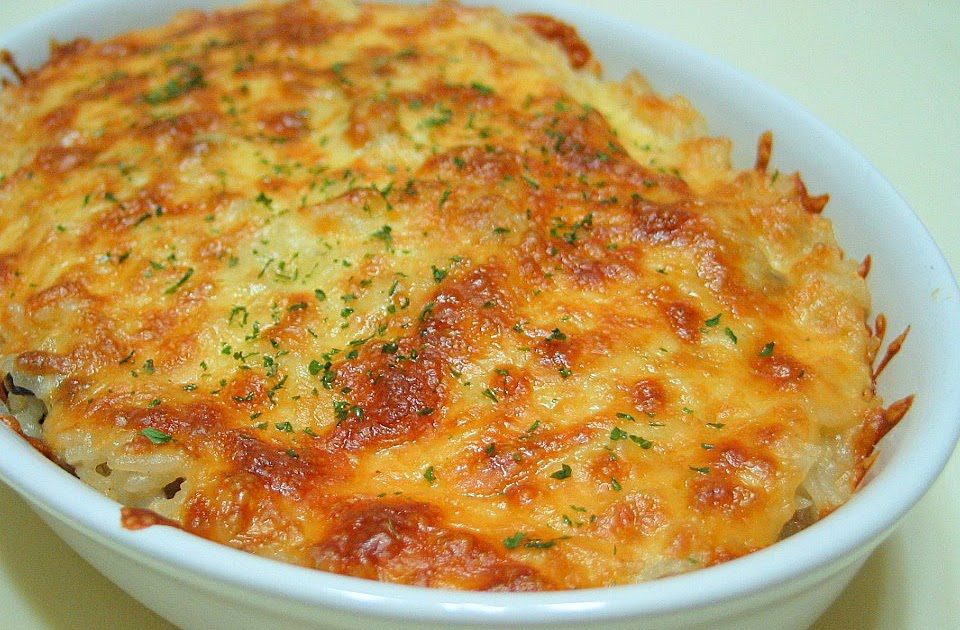 Яйца, запеченные с рисом в соусе из шампиньонов